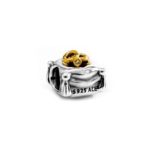 Pandora Sterling Silver, 14k gold and real diamond charm